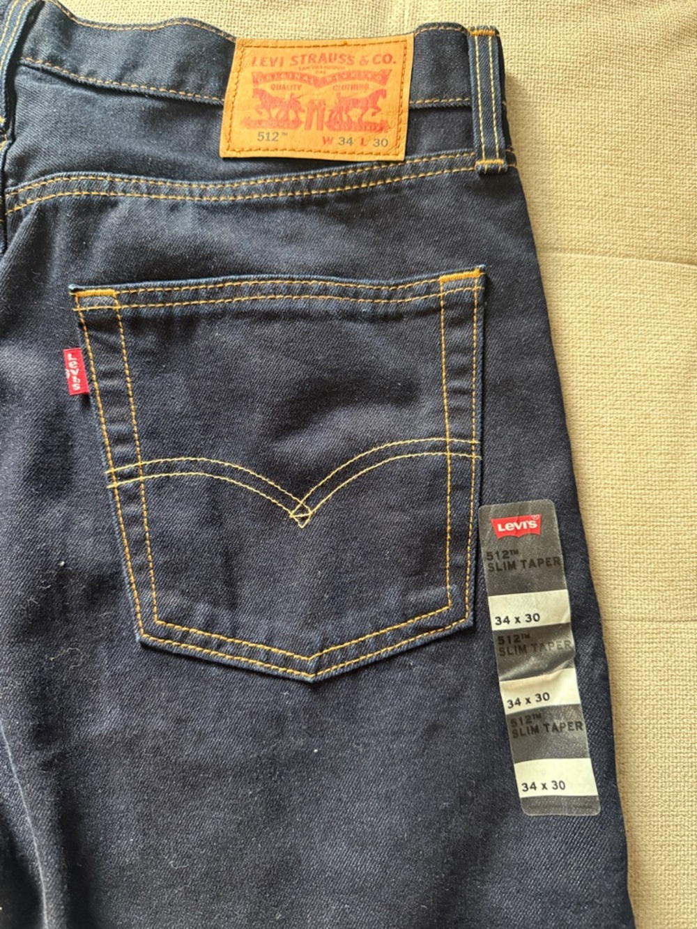 Levi's Slim Taper Jeans in Dark Blue with Contrast Stitching